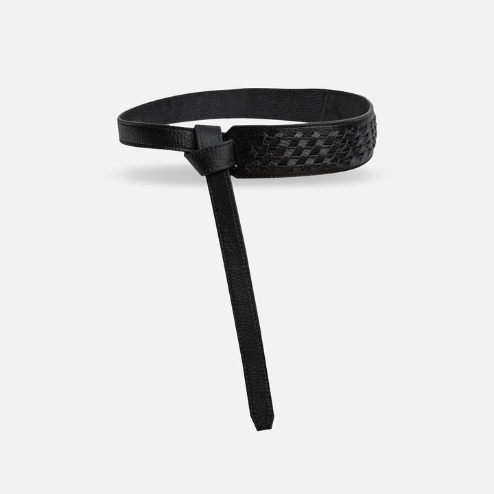 Black leather belt with woven textured detail and elongated tip on plain background