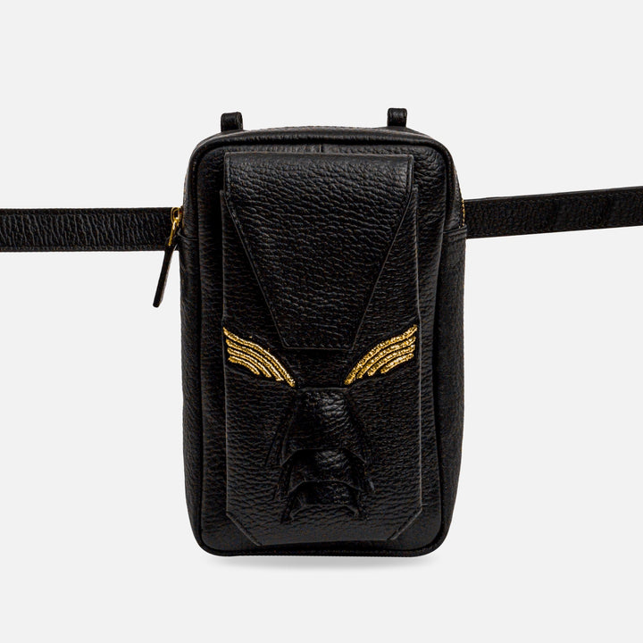 Black leather belt bag with embossed geometric monster face and gold embroidery details