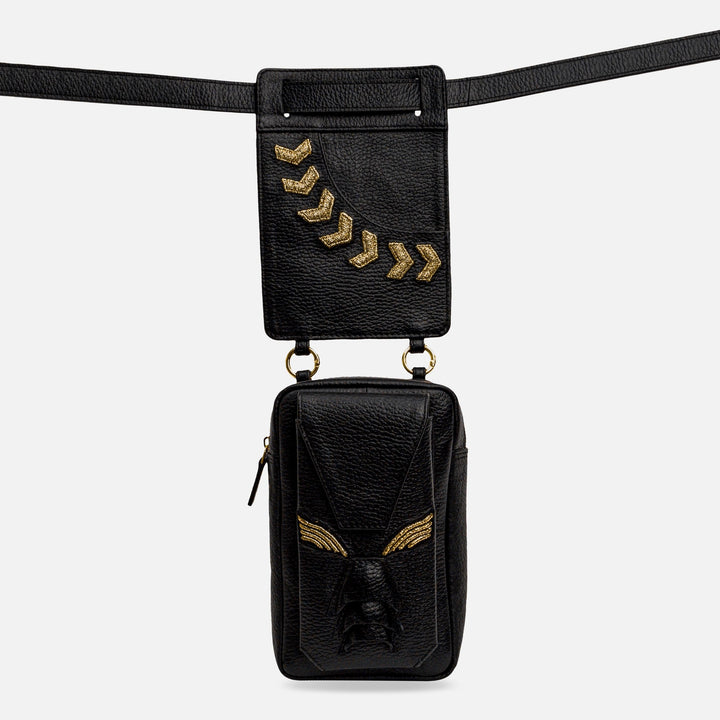 Black leather belt bag with gold chevron accents and embossed design on front pocket