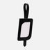Black leather luggage tag with loop and clear ID window isolated on white background