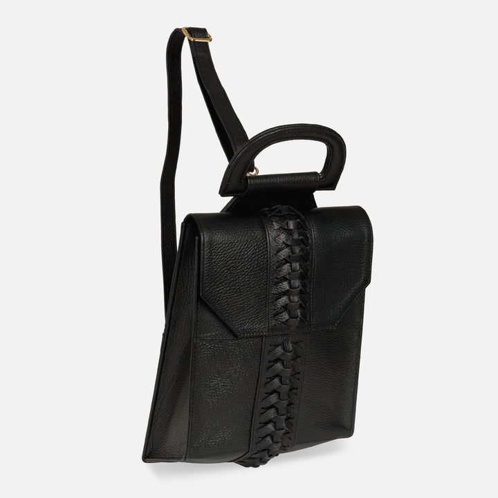 black leather backpack with woven center detail and adjustable shoulder straps