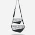 Two black and white crossbody bags with geometric patterns and detachable straps on white background
