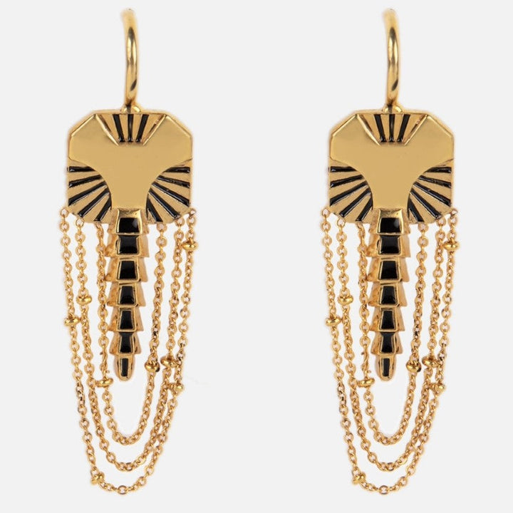 Gold-tone metal earrings with black enamel details and multiple dangling chain accents