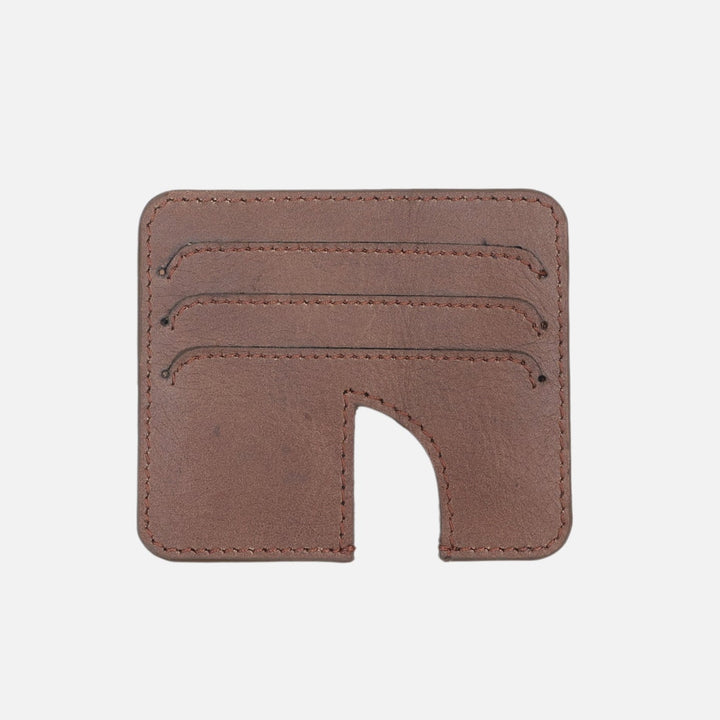 Timeless tan upcycled leather card holder with three card slots and thumb cutout, handcrafted in India
