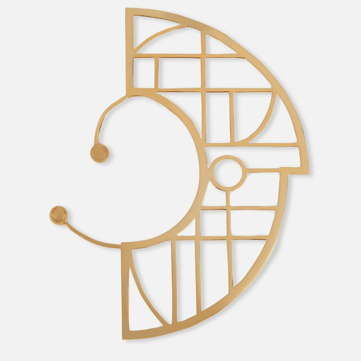 Adjustable gold-toned metal earcuff with geometric lattice design on white background