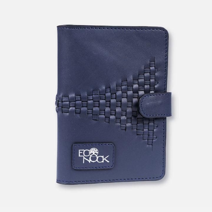 Navy blue EcoNock leather passport cover with woven design and snap closure