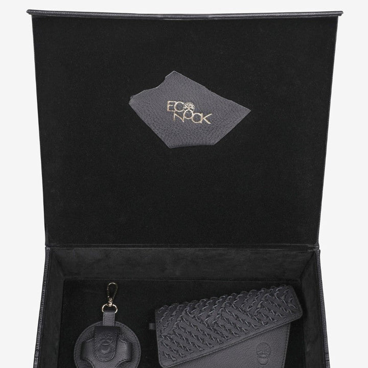 Black upcycled leather gift box with woven design wallet and round keychain by Econock
