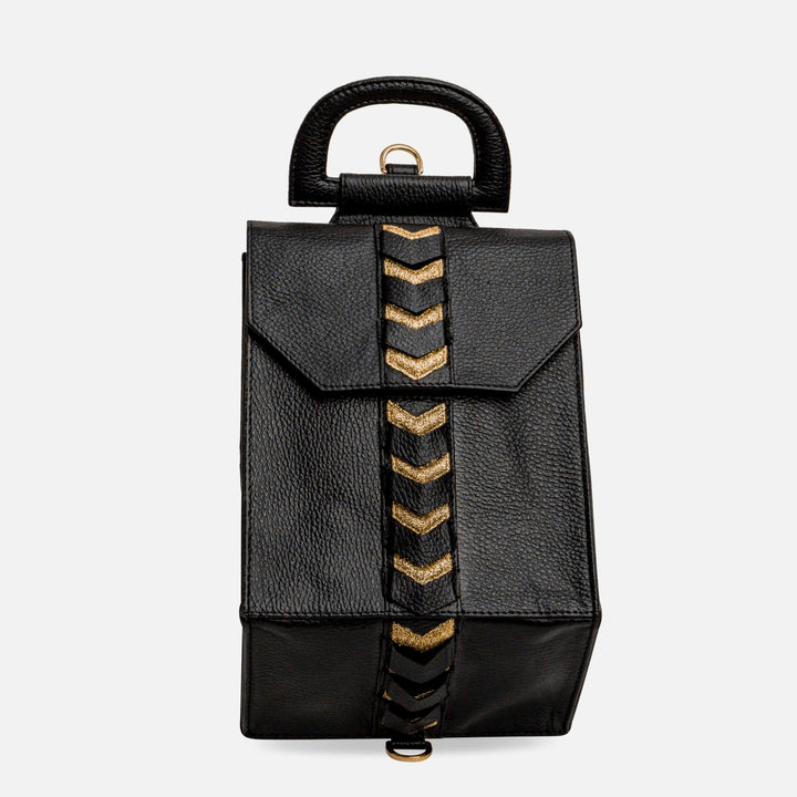 Black leather backpack with structured handle and gold chevron detailing on front