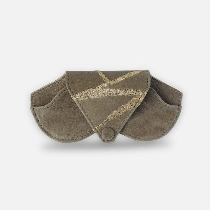 Designer Olive leather sunglass case with gold embroidery and snap closure on white background