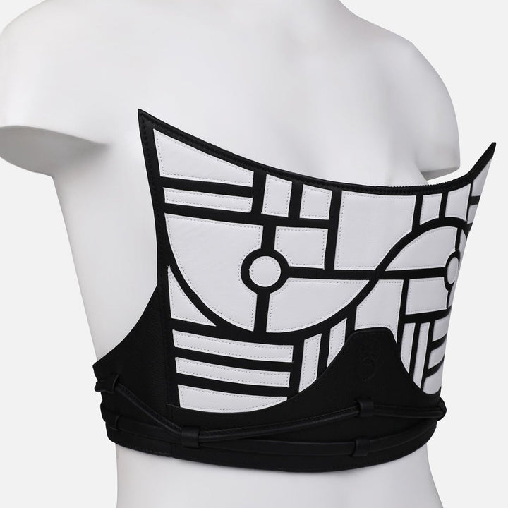 Black and white geometric applique leather corset on mannequin, handcrafted in India