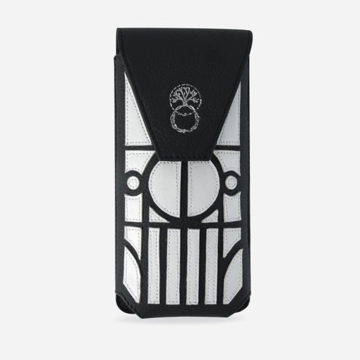 Black and white upcycled leather phone sling with geometric applique and etched tree logo