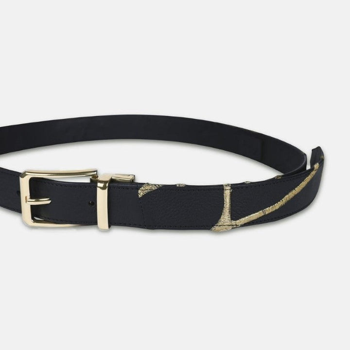 Black leather waist belt with gold embroidered accents and gold metal buckle on white background