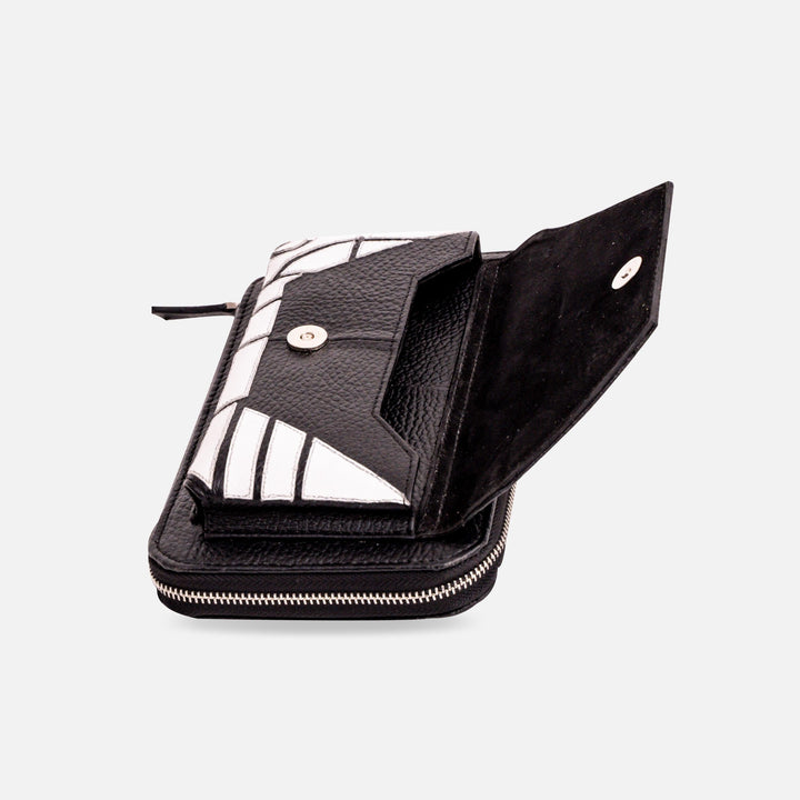 Open black leather wallet with white geometric accents and silver snap button on white background