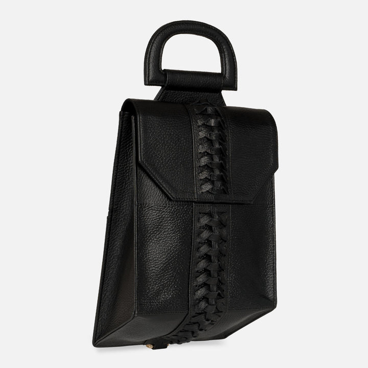 Black leather handbag with top handle and decorative braided detail on front