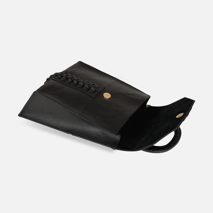 Black leather clutch purse with gold button closure and woven leather detail on white background